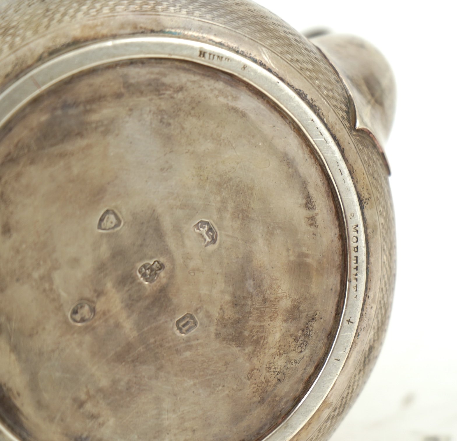 A Victorian engine turned silver teapot by Hunt & Roskell